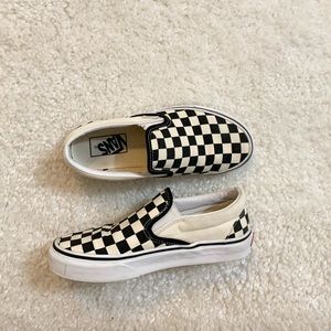 Checkered board slip on vans